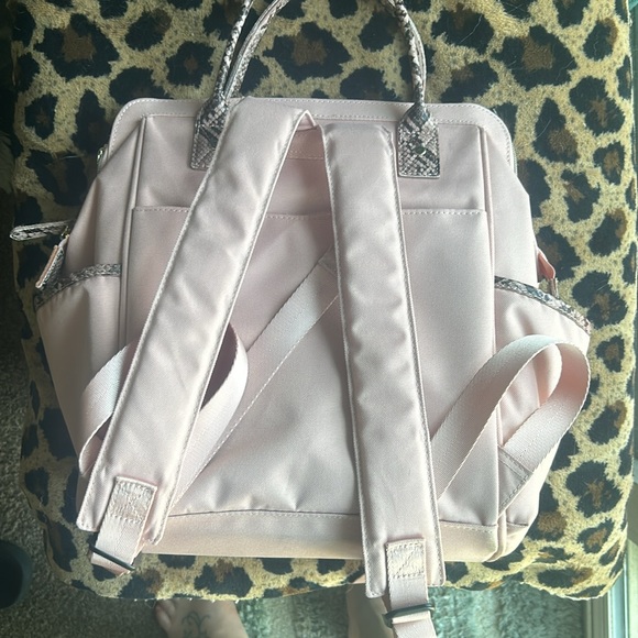 Dusky pink small backpack. Many pockets with zipper close. 13 x 13 - Picture 3 of 5